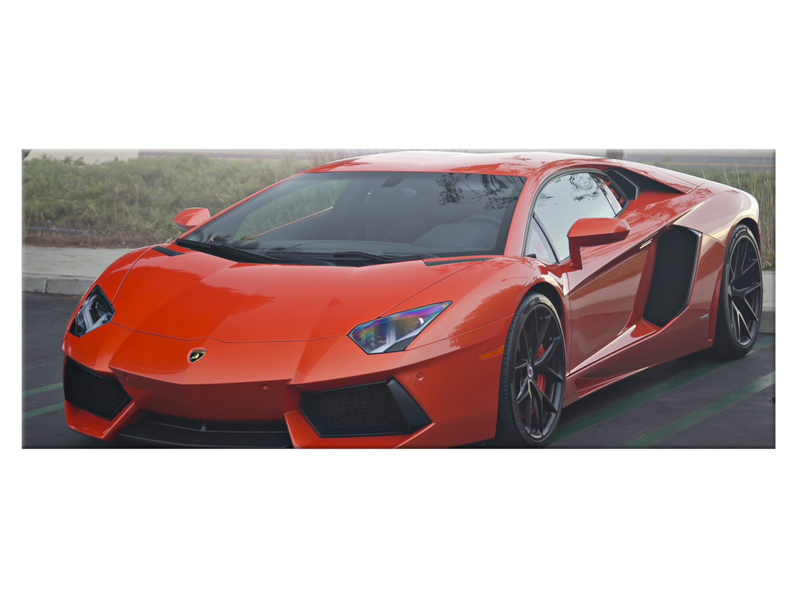 

Obraz Pomarańczowe Lambo Motoryzacja 100x40