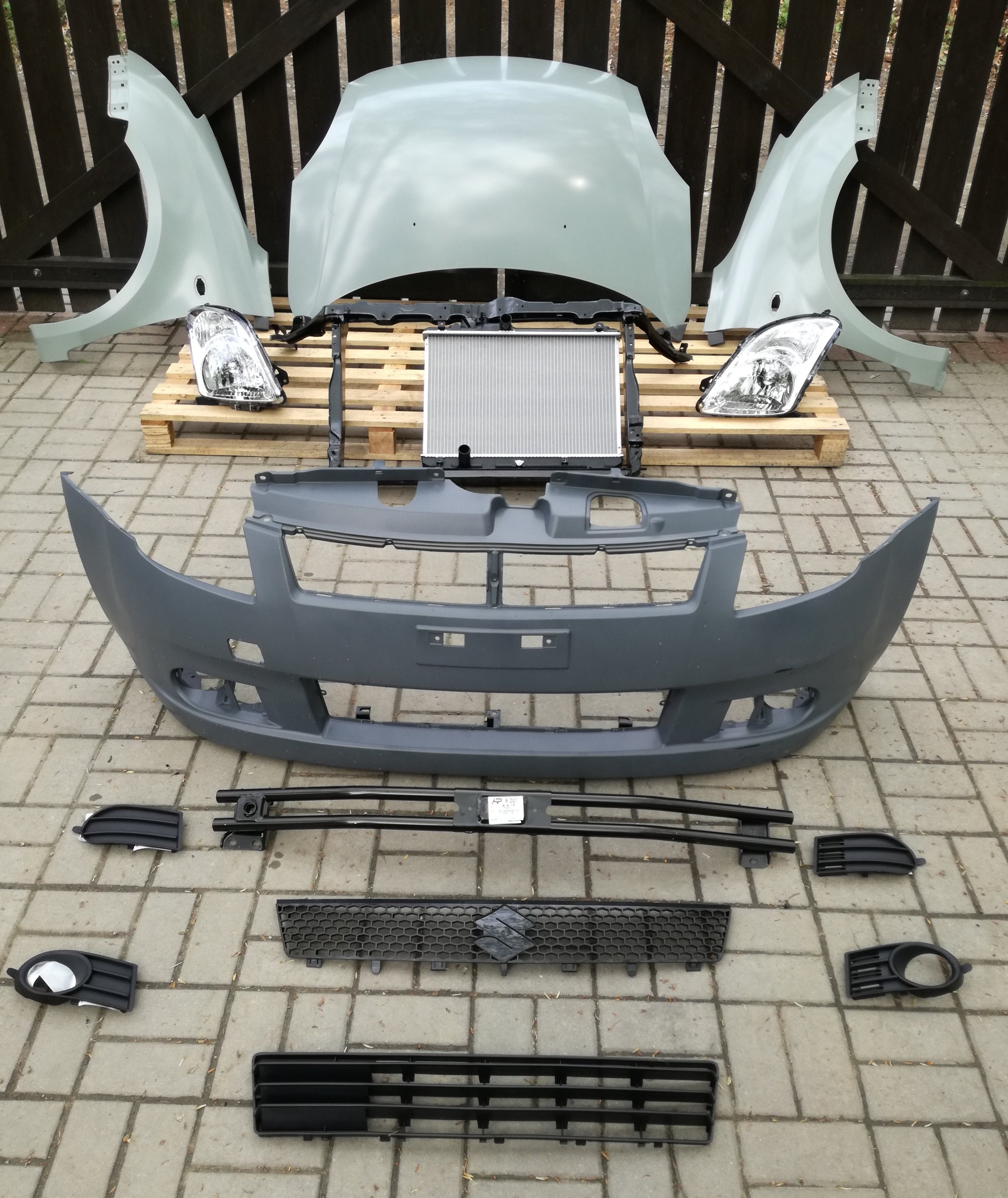 SUZUKI SWIFT MK6 05 -KOMPLET LAMP NOWE DEPO L + P