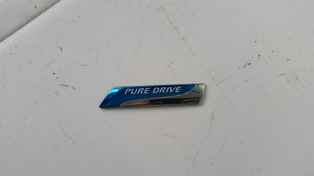 Emblemat Znaczek Klapy Tył Nissan Note Pure Drive
