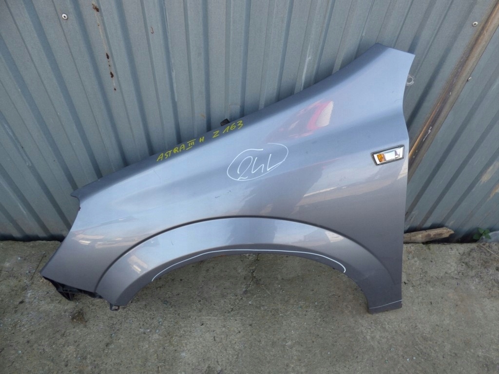 Błotnik lewy przód Opel Astra H 3 III zdrowy Z163