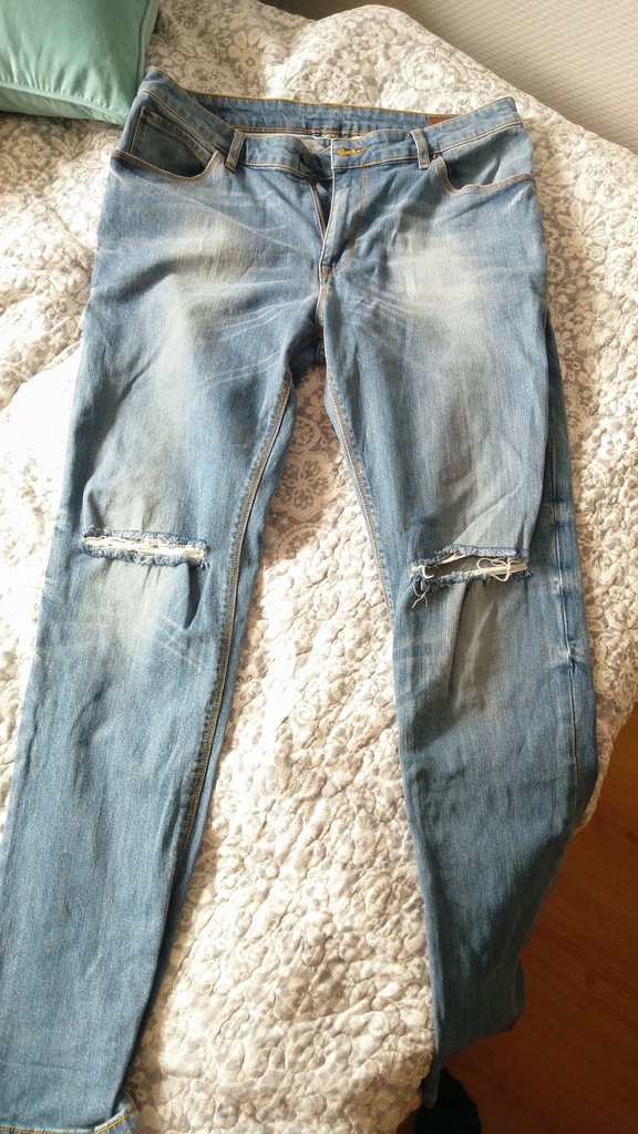 Męskie spodnie jeansy ASOS z dziurami rozmiar 36