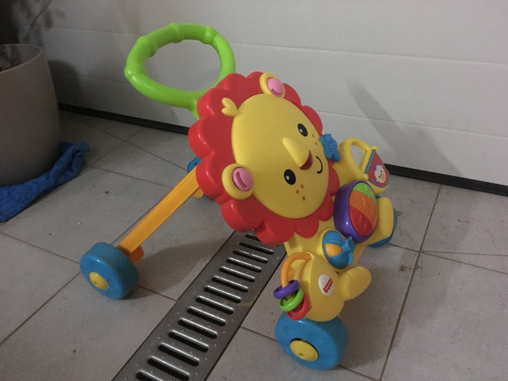 Jeździk chodzik pchacz Fisher Price Lew