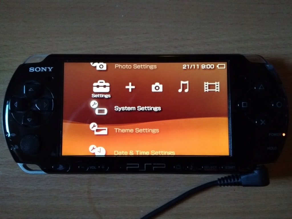 При вставлении диска на консоль sony psp 3008 консоль отключается как исправить