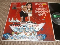 B.BOOKER , G.FOSTER Beware Of Greeks Bearing Gifts