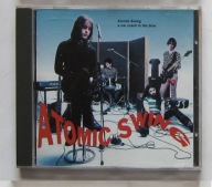 ATOMIC SWING - a car crash in the blue