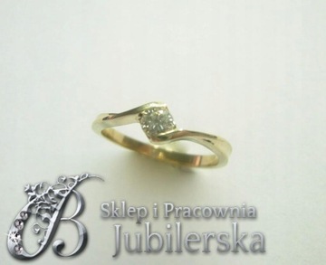 WSPANIAŁY Pierścionek z BRYLANTEM 0.25 ct