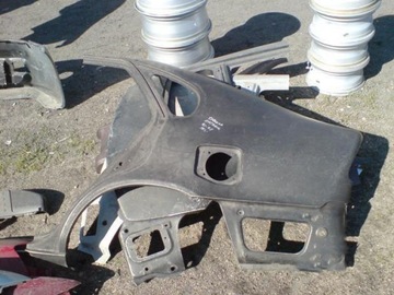 Toyota Corolla Liftback 92-97 tylny lewy błotnik