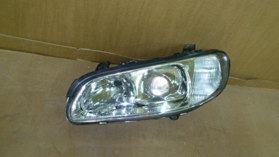 Lampa przód przednia lewa Omega B soczewka xenon