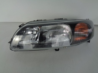 Лампа ліва фара volvo xc70 00-04 фото №1