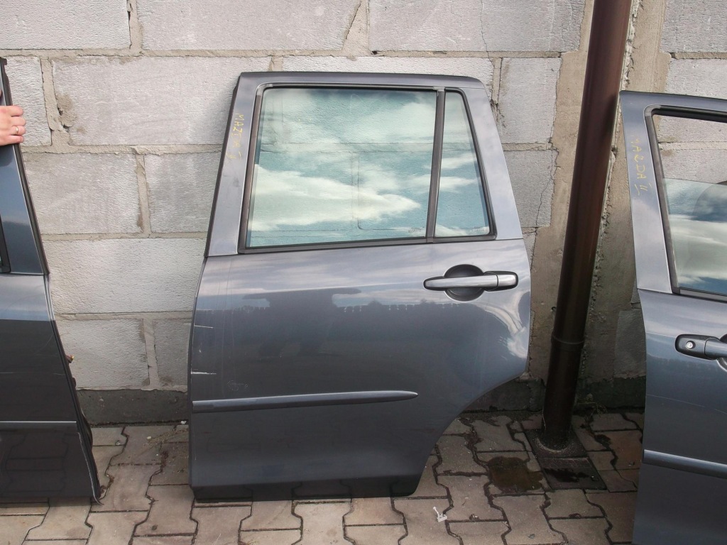 фото №1, Двері лівий задня mazda 2 -доставка-