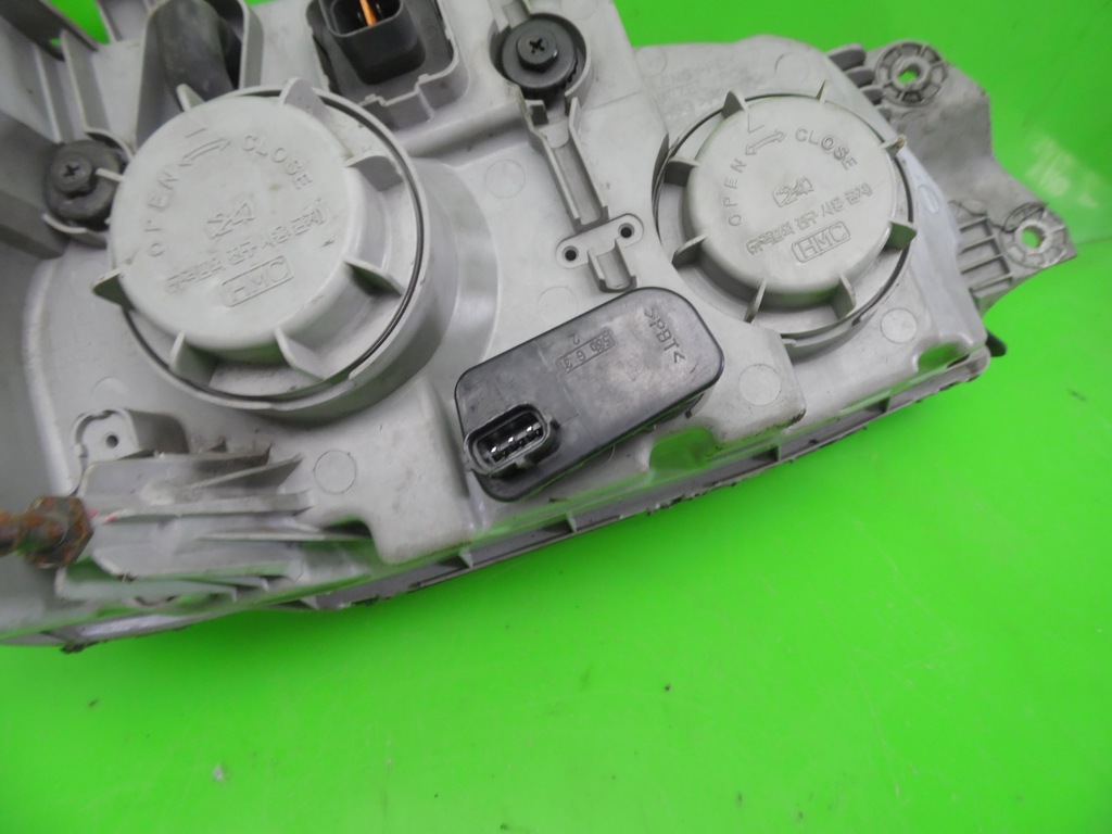 фото №10, Лампа фара перед ліва kia carnival i fl 01-04